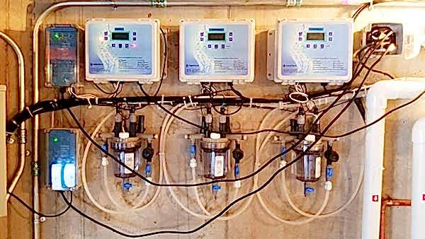 Kid with Broncos hat enjoying pool